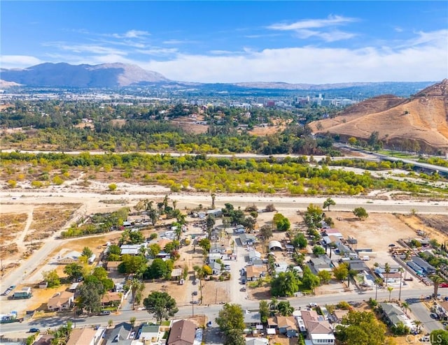 birds eye view of property featuring a mountain view