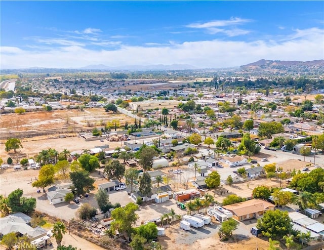 drone / aerial view featuring a mountain view