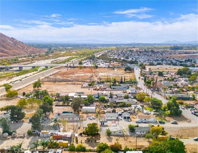 drone / aerial view featuring a mountain view