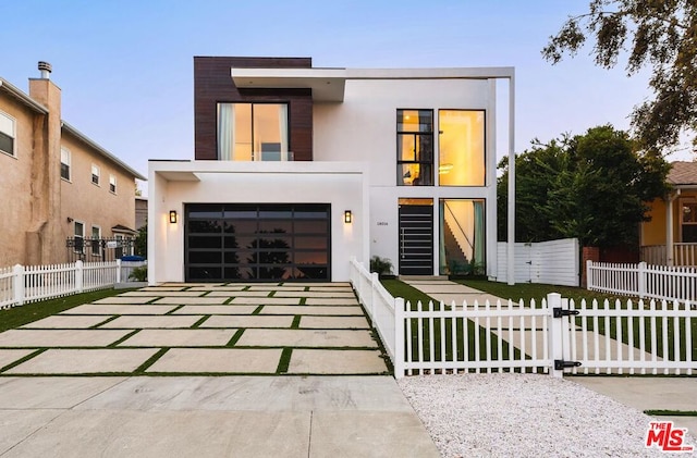 modern home featuring a garage