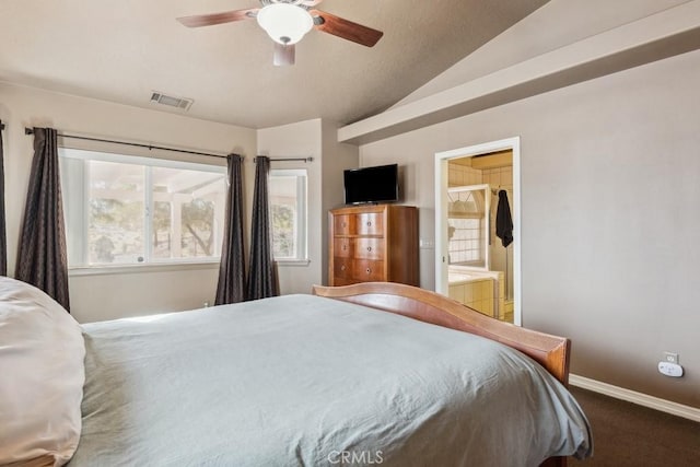 carpeted bedroom with lofted ceiling, connected bathroom, and ceiling fan