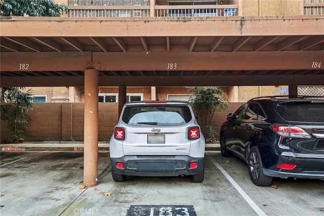 view of car parking with a carport