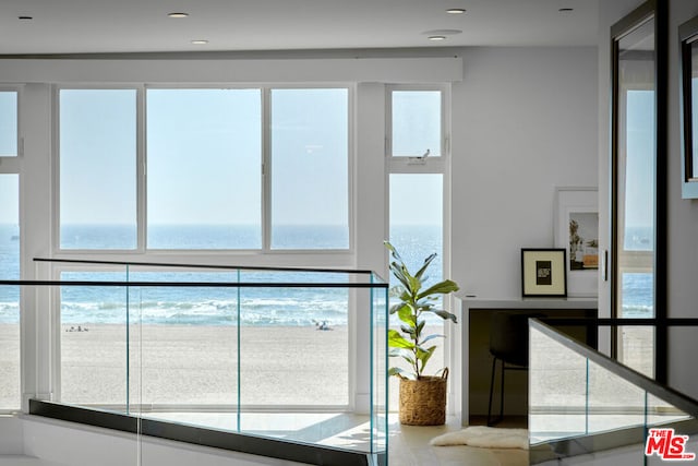 interior space featuring a water view