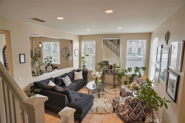 living room featuring light tile patterned flooring