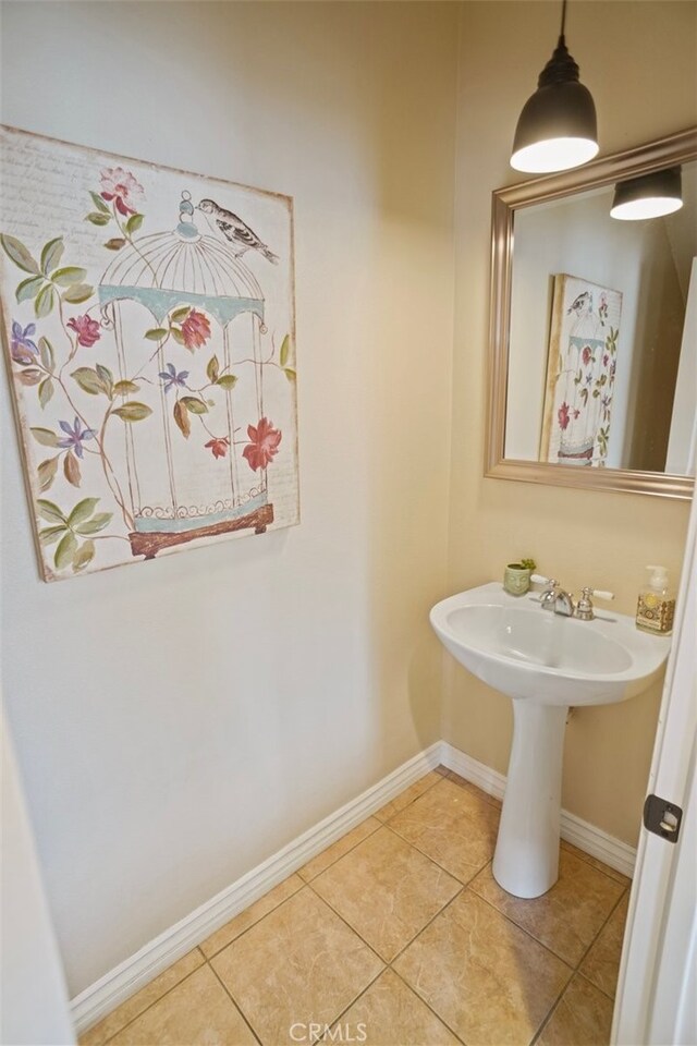 bathroom with tile patterned flooring