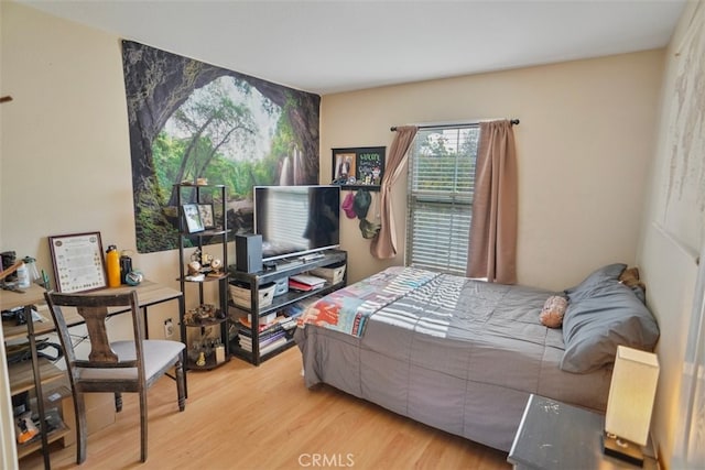 bedroom with light hardwood / wood-style floors