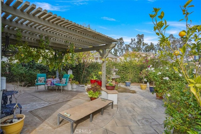 view of patio featuring a pergola