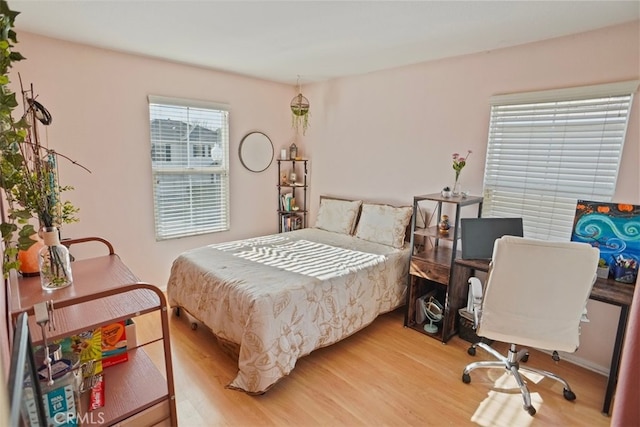 bedroom featuring hardwood / wood-style floors