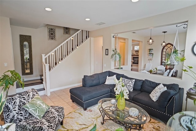 living room featuring light tile patterned floors