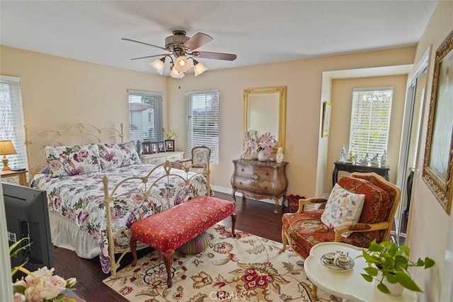 bedroom featuring ceiling fan and wood-type flooring