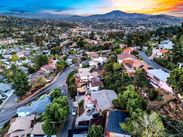 aerial view at dusk with a mountain view