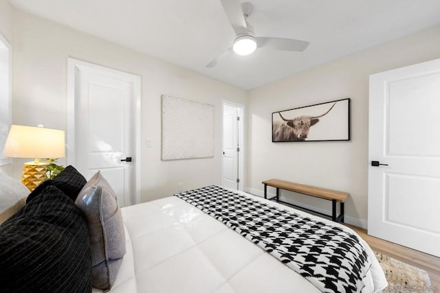 bedroom featuring ceiling fan and light wood-type flooring