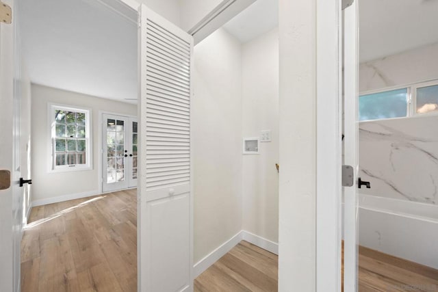 hall featuring light hardwood / wood-style floors