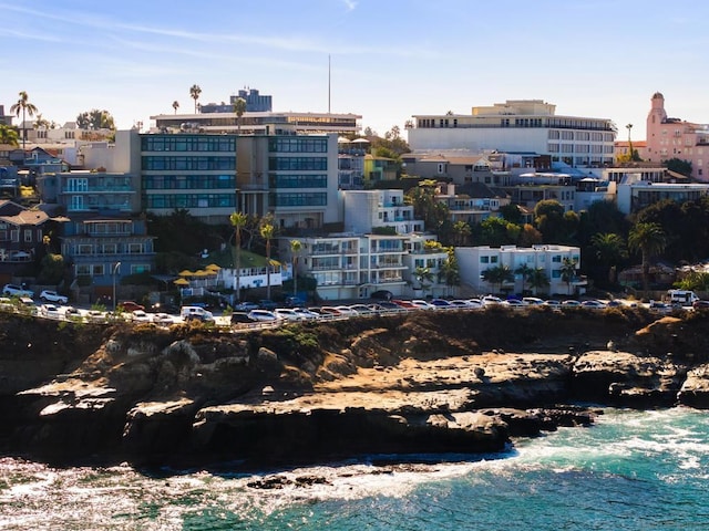 view of building exterior with a water view