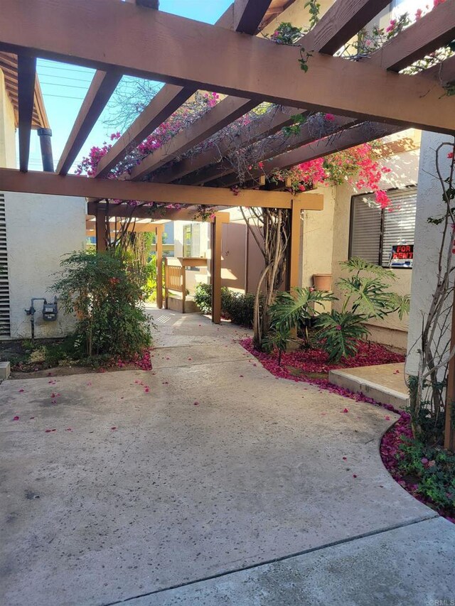 view of patio featuring a pergola