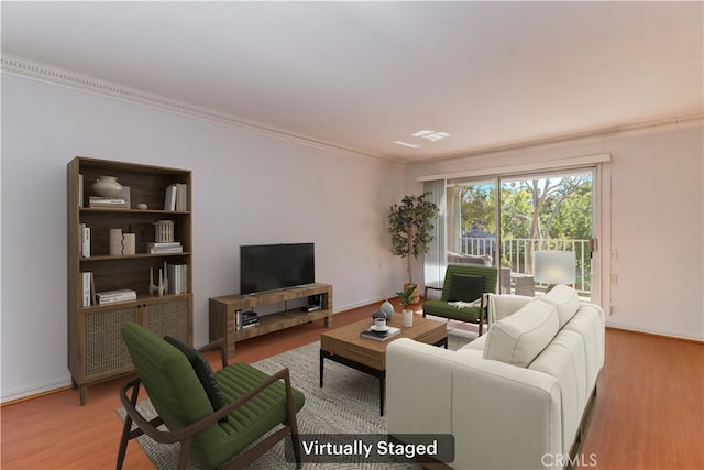 living room featuring crown molding and light hardwood / wood-style flooring