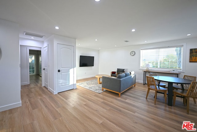 living room with light wood-type flooring