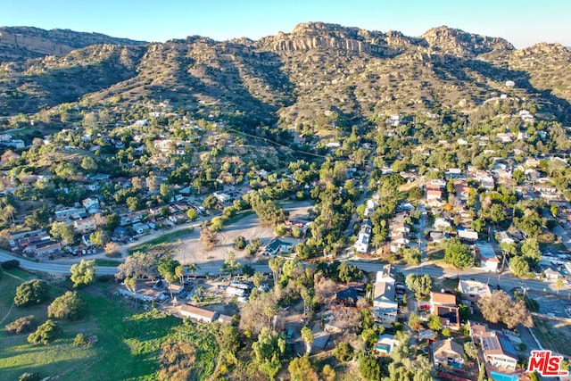 bird's eye view with a mountain view