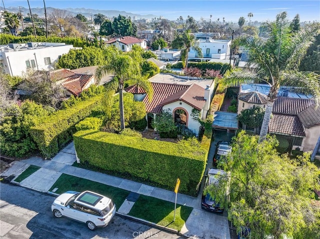 birds eye view of property with a residential view