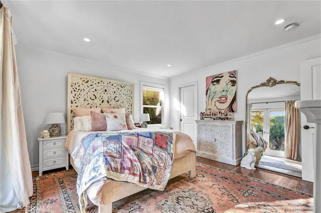 bedroom featuring access to outside, crown molding, recessed lighting, and wood finished floors