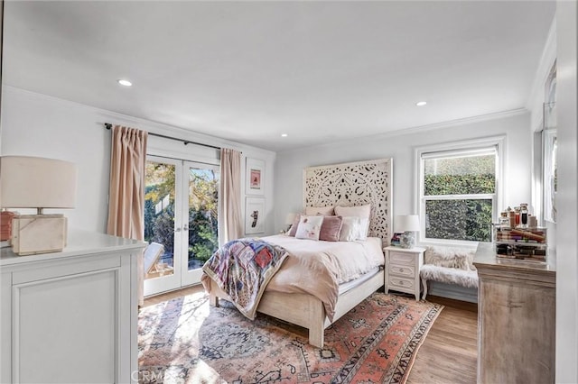 bedroom with recessed lighting, light wood-style floors, access to exterior, ornamental molding, and french doors