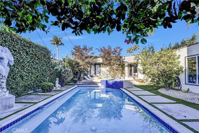 pool featuring a patio area and french doors