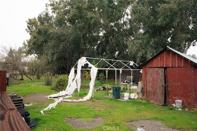 exterior space with a shed