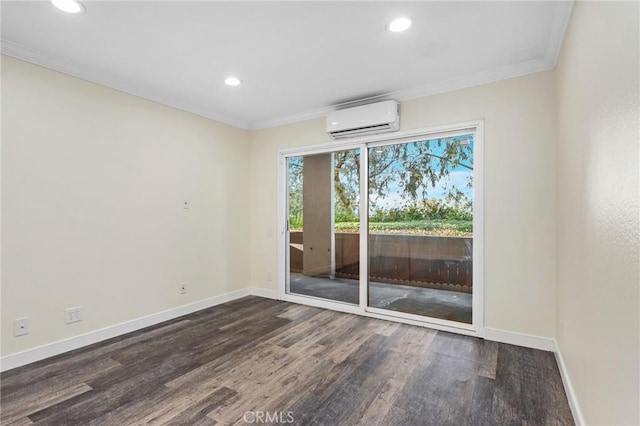 empty room featuring dark wood-type flooring, ornamental molding, and a wall unit AC