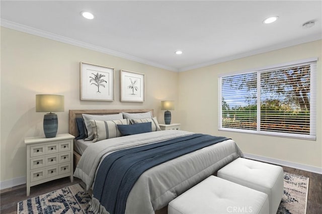 bedroom featuring hardwood / wood-style flooring and crown molding