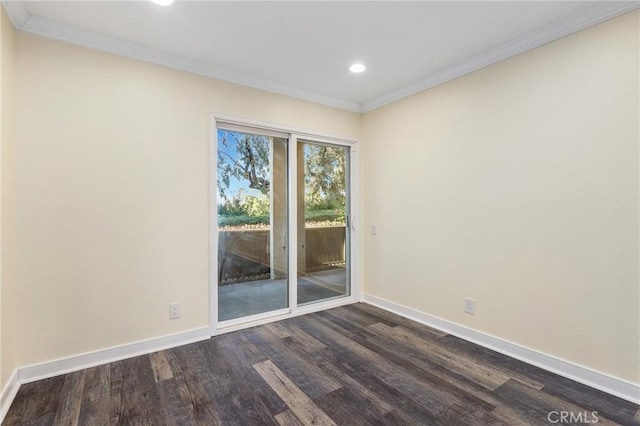 unfurnished room featuring dark hardwood / wood-style flooring and crown molding