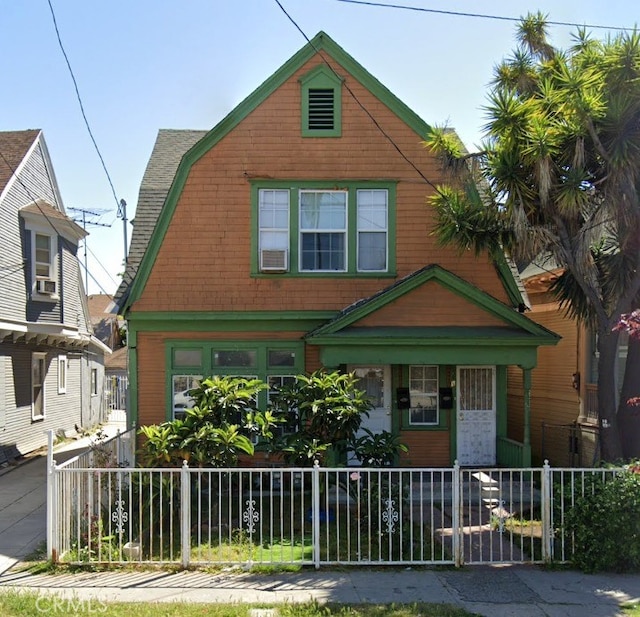 view of front of home featuring cooling unit