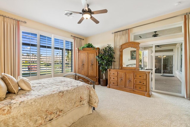 bedroom featuring ceiling fan, light colored carpet, and access to outside