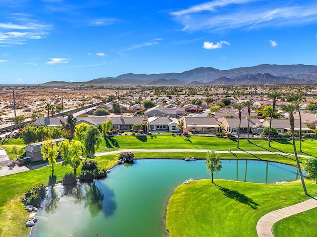 aerial view with a water and mountain view