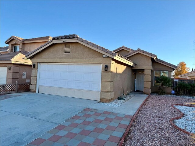 view of front of property featuring a garage