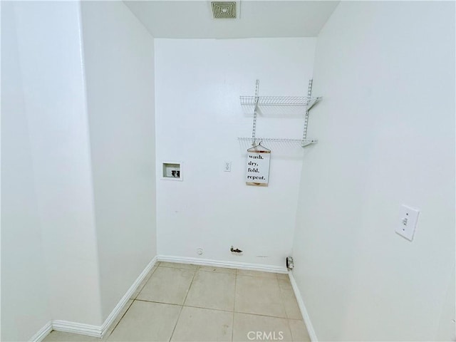 laundry room featuring light tile patterned floors, gas dryer hookup, and hookup for a washing machine