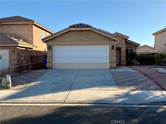 view of front of property featuring a garage