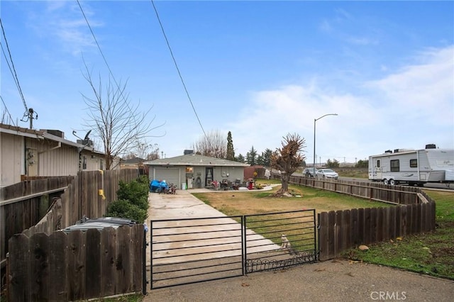 view of front of home featuring a garage and a front yard