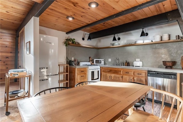 kitchen with light wood-type flooring, wooden ceiling, white appliances, beam ceiling, and backsplash