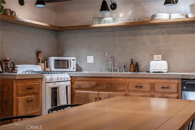 kitchen featuring dishwasher, pendant lighting, white range with gas stovetop, and backsplash