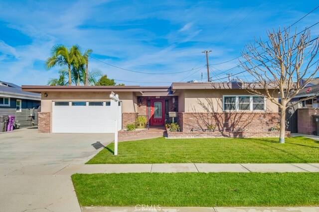 ranch-style house with a front lawn and a garage