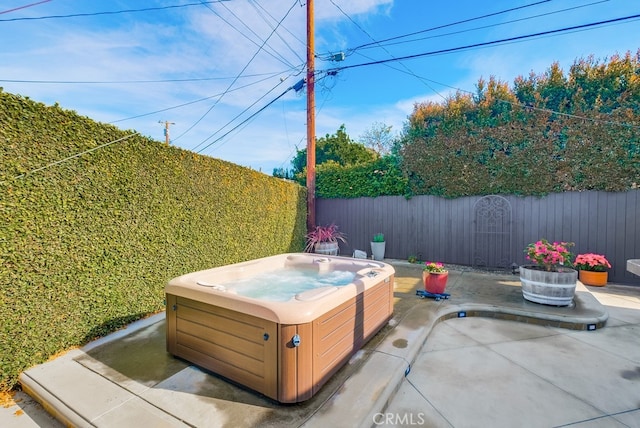 view of patio featuring a hot tub