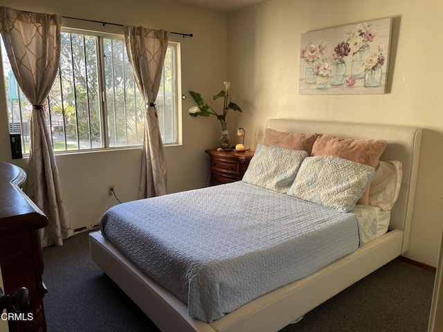 bedroom featuring carpet