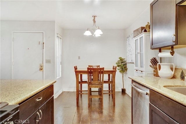 dining room with a chandelier and wood-type flooring