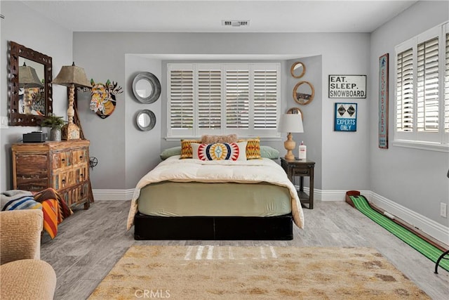 bedroom featuring light hardwood / wood-style flooring