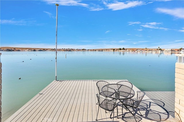 dock area featuring a water view