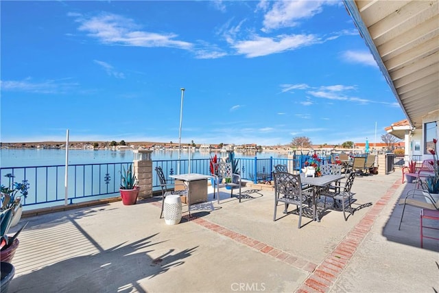 view of patio featuring a water view