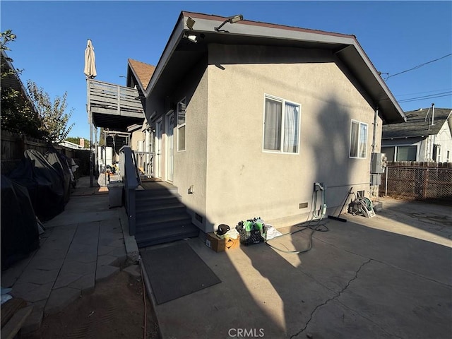 back of house featuring a patio