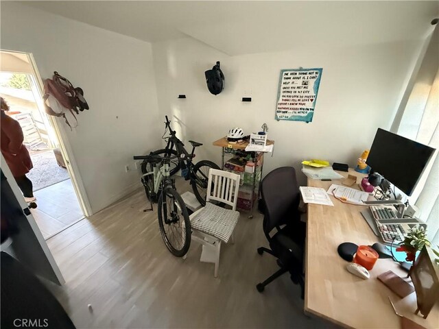 home office featuring hardwood / wood-style floors