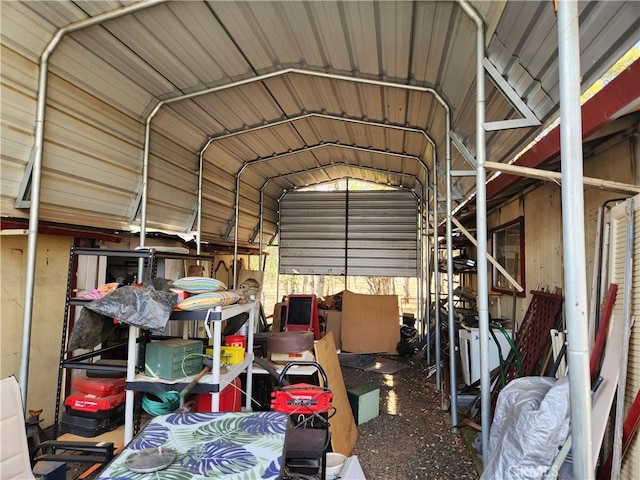 view of vehicle parking with a carport