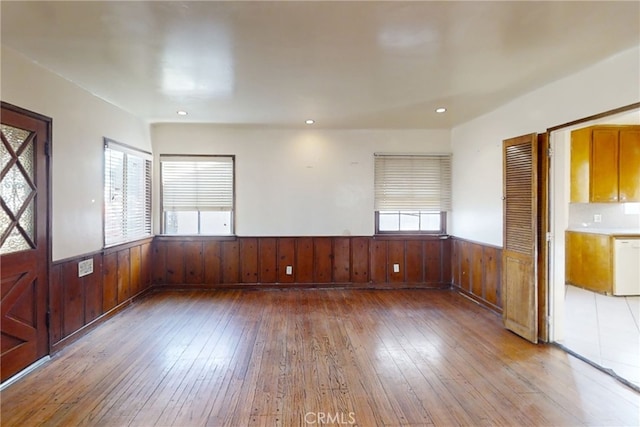 unfurnished room featuring light wood-type flooring